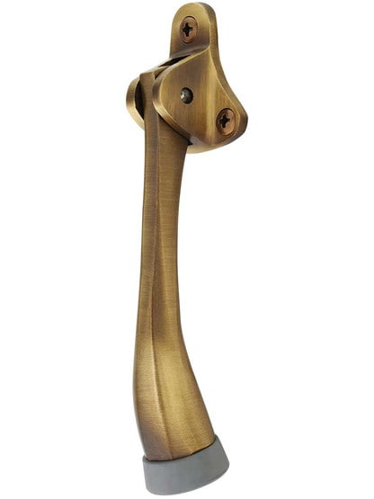 5 inch Solid Brass Kickdown Door Holder in Antique Brass.
